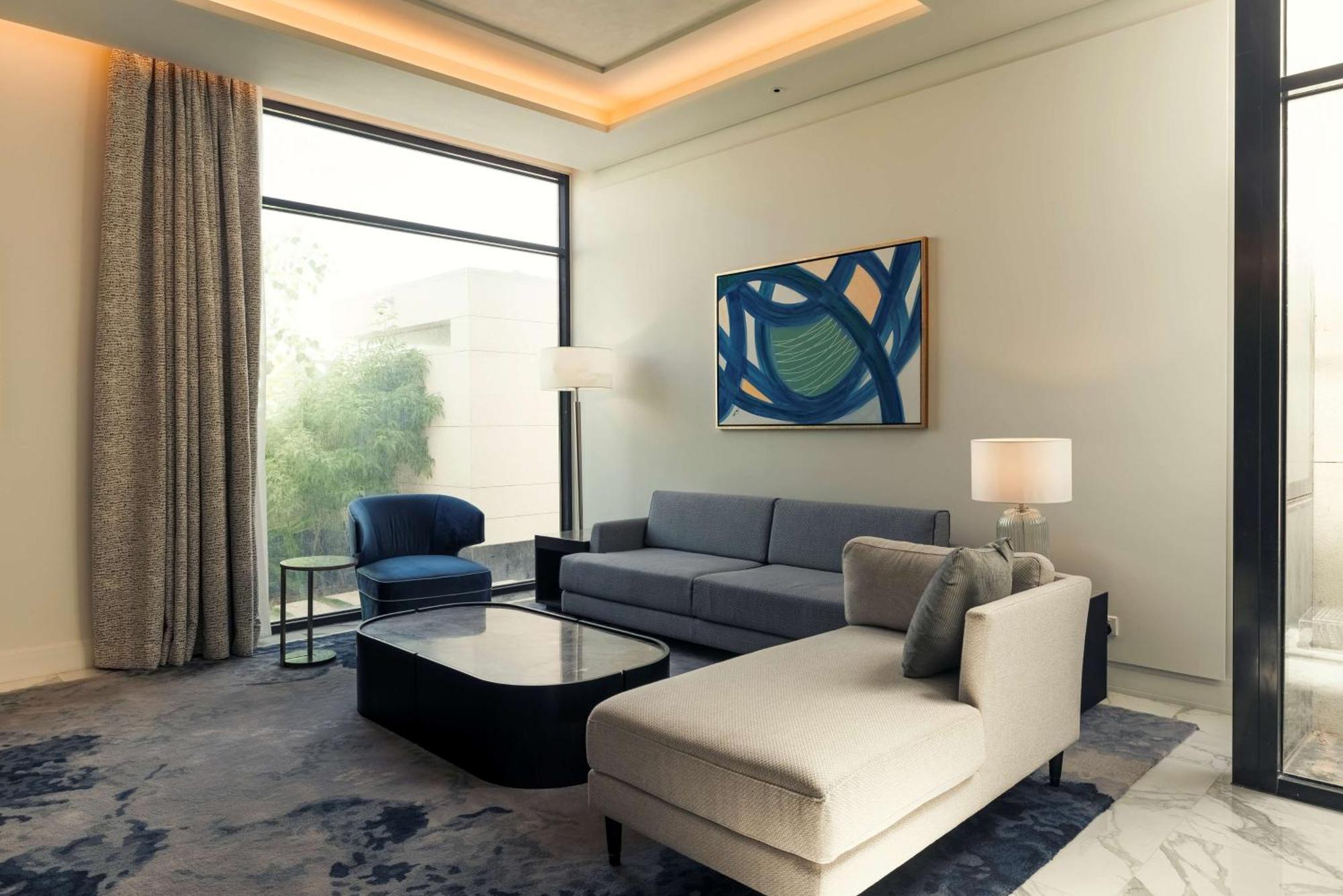 Mansard Riyadh, A Radisson Collection Hotel Εξωτερικό φωτογραφία A living room at the hotel
