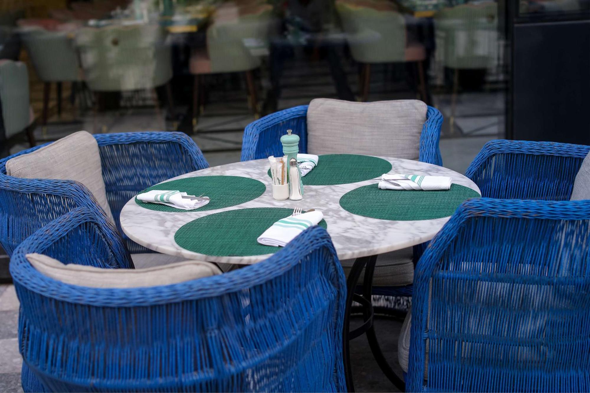 Mansard Riyadh, A Radisson Collection Hotel Εξωτερικό φωτογραφία A table with placemats